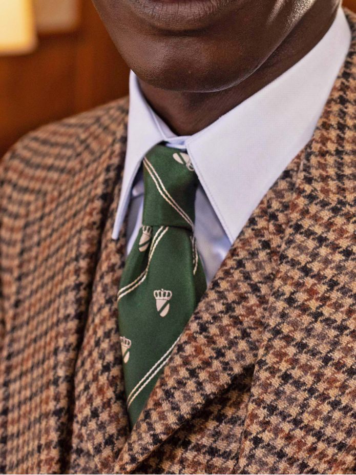 Cravate en soie verte à motifs blasons